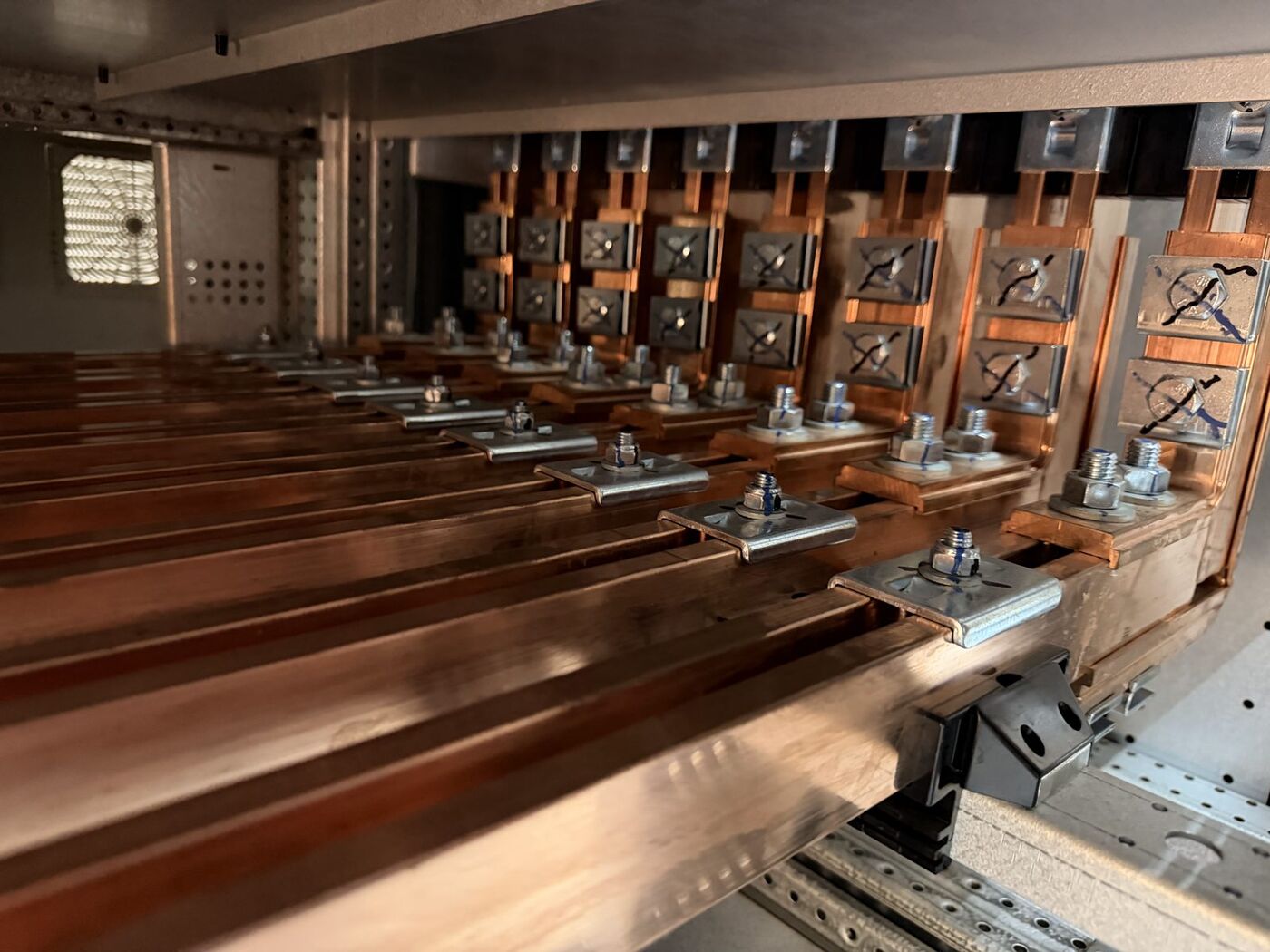 Bolted copper busbar joints inside an LV switchboard